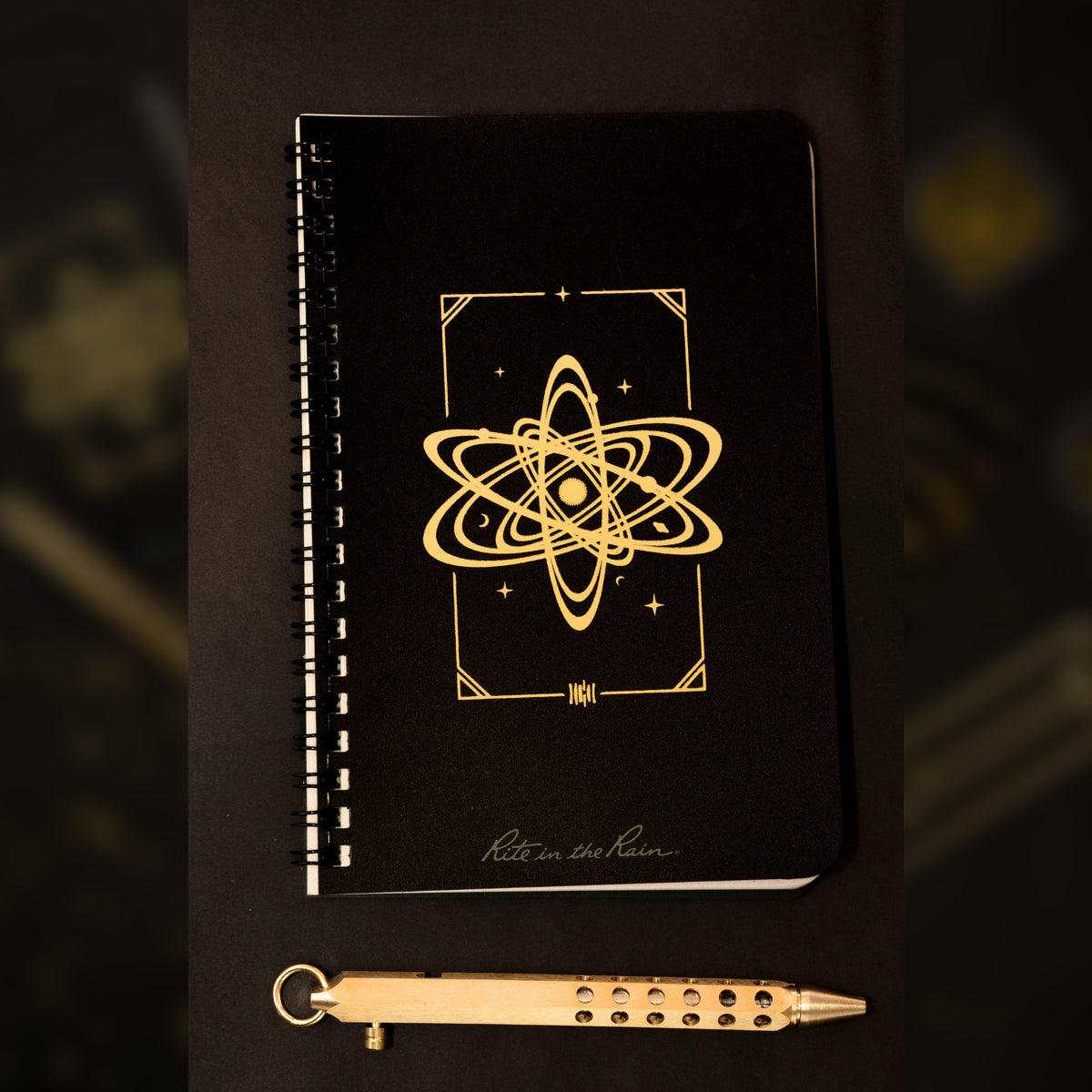 Notebook and field pen in Ruins theme
